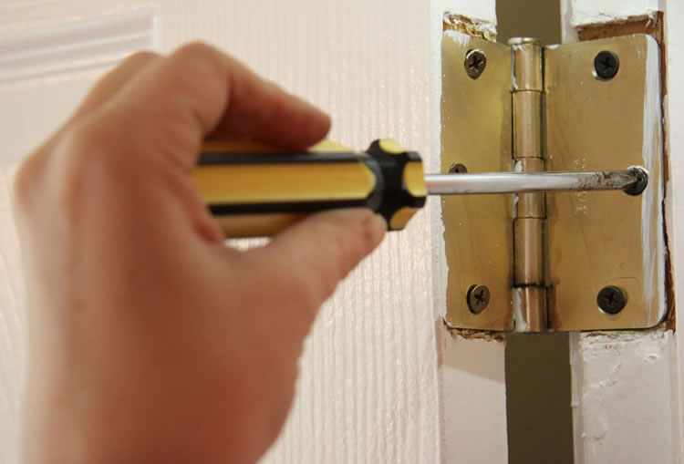 DIY Installing New Door Hinges | www.onbetterliving.com