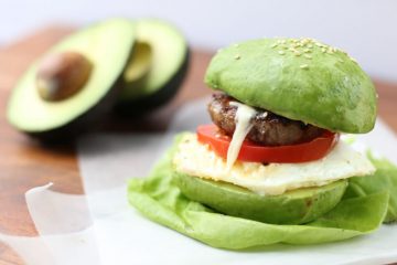 Avocado "Bun" Breakfast Sandwich With Sausage, Egg, Tomato and White Cheddar